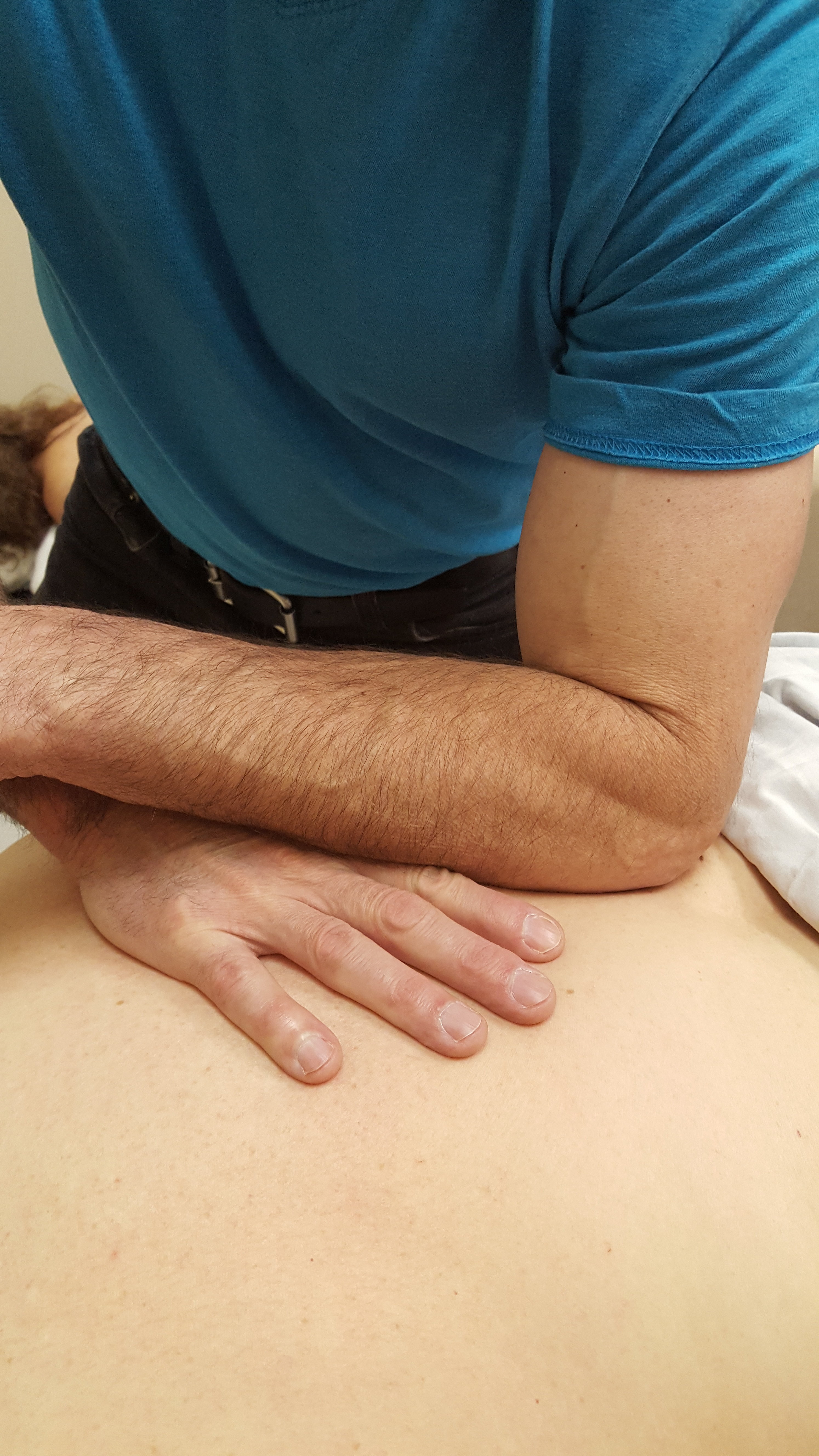 Will a Low Massage Table Hurt Your Back?
